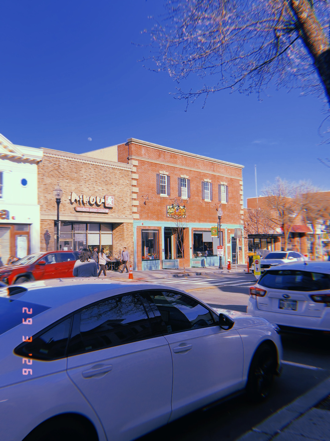 Orale Mexican Kitchen storefront on South Street, brick building, blue sky, Saturday afternoon